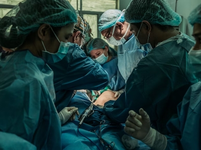 doctors operating on a patient on bed surgery